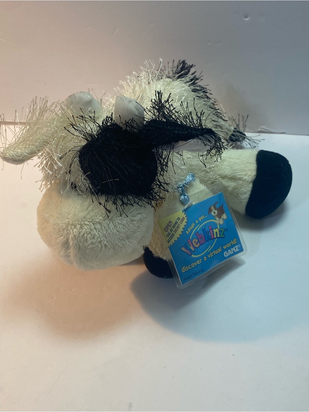 Webkinz cow W code